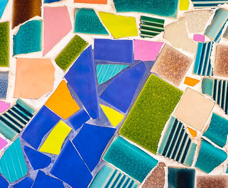 broken tiles recycled into a mosaic signpost.jpeg